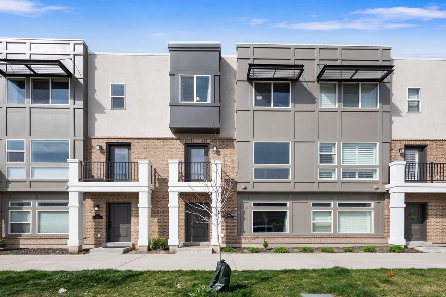 Live just steps from the vibrant energy of Station Park in this beautifully appointed Farmington townhouse. Enjoy stunning mountain views paired with warm neutral tones and modern finishes including granite countertops, stainless steel appliances, and an included washer and dryer for ultimate convenience.  Station Park offers some of the area's best dining, shopping, and entertainment, all right outside your door. With immediate access to the UTA commuter rail station, I-15, Highway 89, and the Legacy Highway, and Lagoon.  This location is a true hub of connectivity and convenience.  Guest parking is located directly outside the unit for easy access, while direct entry to nearby biking and running trails makes it effortless to enjoy the outdoors. This home delivers the perfect blend of lifestyle, location, and low-maintenance living. Square footage figures are provided as a courtesy estimate only and were obtained from county records.  Buyer is advised to obtain an independent measurement.