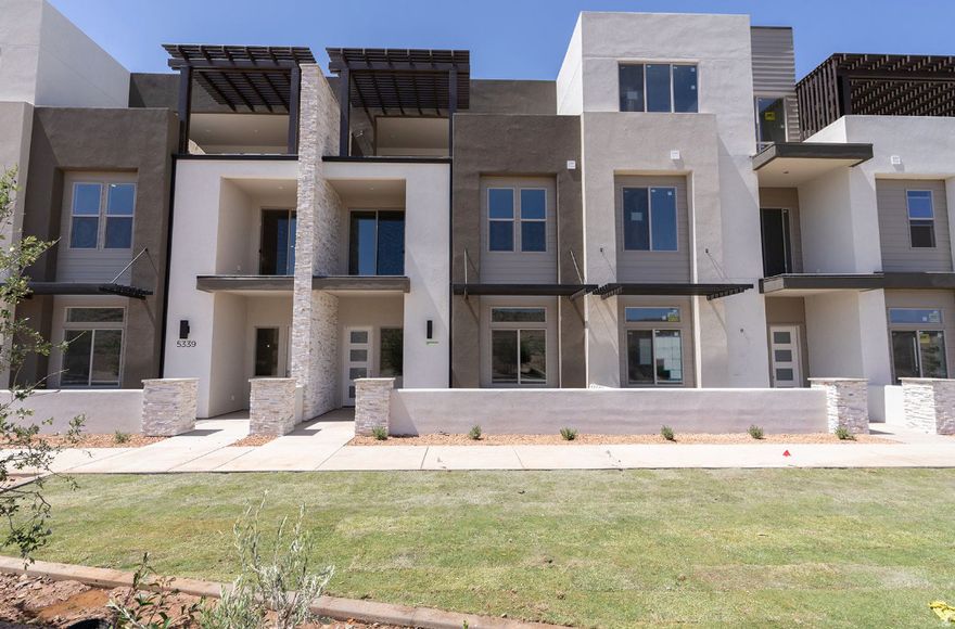 Located in the vibrant Desert Color community, the Monterey offers 3,400 square feet of contemporary living. With 6 bedrooms and 6 bathrooms, this townhome features a gourmet kitchen, built-in banquette, and mini bar, making it ideal for hosting family or friends. Bunk rooms create extra space for large groups, while the second-floor deck, complete with a hot tub and fire table, invites relaxation in this premier vacation destination.