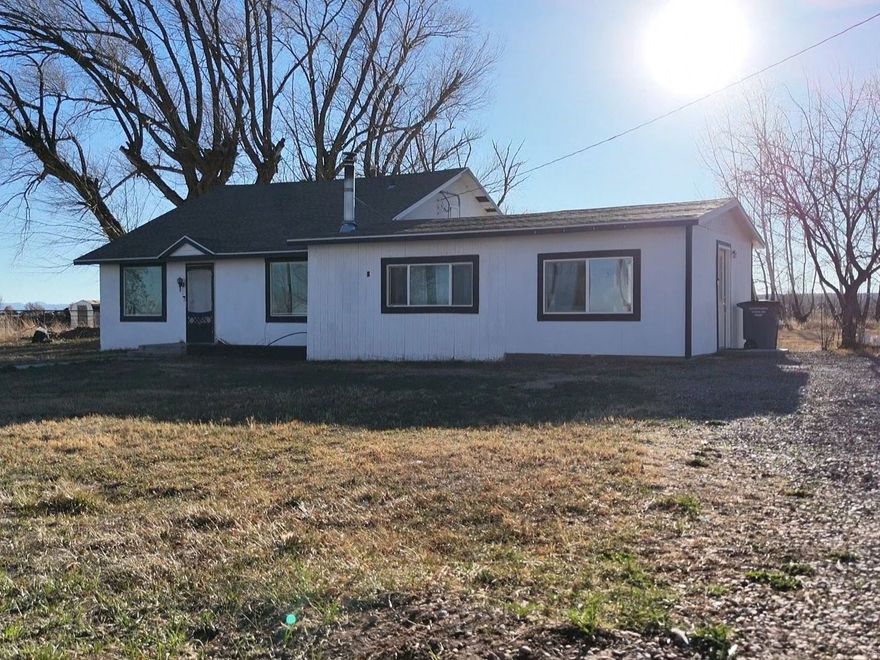 Adorable country cottage situated on a spacious 0.81-acre lot with plenty of room to enjoy the outdoros. This home has been recently updated throughout and features a furnace and central air.  The interior offers 2 bedrooms and 1.75 bathrooms, along with an additional versatile room that can be used as an office, craft room, or flex space to suit your needs.  A new feature of this property is the recently added salon located at the back of the home-fully set up and ready for you to welcome clients.    Square footage figures are provided as a courtesy estimate only and were obtained from Previous Listing.  Buyer is advised to obtain an independent measurement.