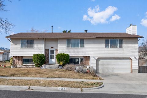 Photo of 4502 W WOODGROVE DR, West Valley City, UT 84120 (MLS # 2140527)