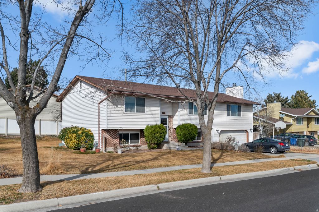 Photo of 4502 W WOODGROVE DR, West Valley City, UT 84120 (MLS # 2140527)