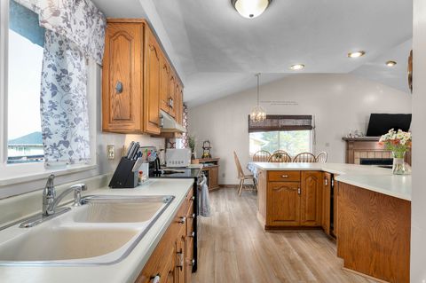 Tiny photo for 4502 W WOODGROVE DR, West Valley City, UT 84120 (MLS # 2140527)