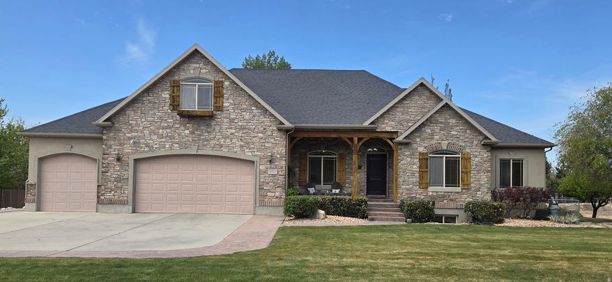 Beautiful Rambler home with mountain views on .71-acre in Highland, conveniently located across from Freedom Elementary.  Entire home recently painted. Main level features open floor plan with formal living room, vaulted family room with fireplace, kitchen and dining area with main level laundry, 5 bedrooms and 3 full bathrooms. Large spacious basement featuring space for office/den/playroom/exercise room and potential ADU for generational living or income potential, 2 bedrooms, 2 full bathrooms, laundry and large storage areas. Beautiful back yard with sidewalks, sport court, large covered patio for entertaining and garden with grow boxes. Save on electricity with the owned active solar panels. Feature includes exterior EV charger and wired 220 outlet for 2nd car charger in the garage. You will love the large 3-car garage with builtin storage cabinets and RV parking. Come enjoy the beautiful sophisticated location with convenient access to trails, schools, shopping, freeway access, Silicon Slopes and just 10 minutes to the Traverse Outlets.