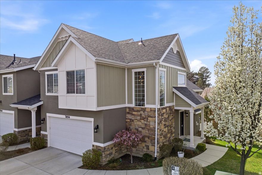 Everything has been accounted for in this lovely townhome. The well-planned Cottages on 78th community was completed in 2014, built with high-quality construction materials and tasteful finishes. This bright and airy home has vaulted ceilings and an abundance of natural lightone of the perks of being an end unit. The main level includes a spacious, open concept living area and kitchen with new appliances. Upstairs, you'll find the laundry facilities and three bedrooms, including a large primary suite with a private ensuite and walk-in closet. The lower level adds versatility with a fourth bedroom, attached bathroom, and a family room. Additional noteworthy features include an attached two car garage and a covered deck that overlooks the private backyard.