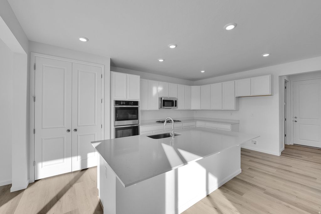 Photo of 8655 N HALLORAN CT #1324, Lake Point, UT 84074 (MLS # 2124842)