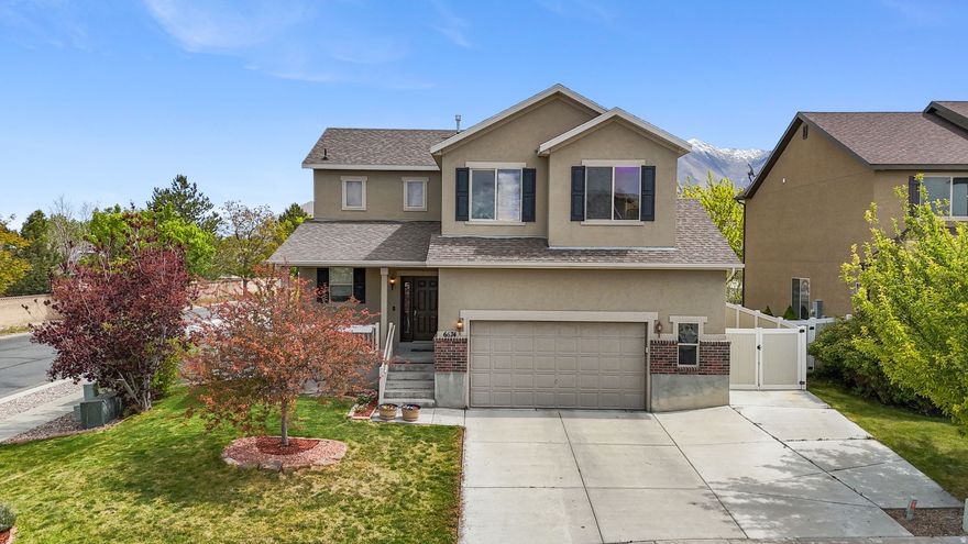 Beautifully maintained home on a desirable corner lot in Stansbury Park with thoughtful upgrades and room to grow. The main floor features 9' ceilings and an open, functional layout with upgraded cabinetry, granite countertops, and durable laminate wood flooring in the kitchen, nook, and entry. Tile flooring in the bathrooms and laundry adds both style and practicality. The extra-large garage is a standout, offering exceptional storage with a professionally built, stand-on storage shelf-perfect for maximizing space and organization. Enjoy outdoor living with Porterway Park just a short walk away, featuring lighted pickleball courts, playground, tennis courts, baseball fields, miles of walking paths, and an 18-hole disc golf course. Conveniently located near State Route 138 for easy access-just 30 minutes to Salt Lake City International Airport and close to downtown Salt Lake City. Unfinished basement provides excellent potential for future expansion. A great opportunity to own a well-appointed home in a growing community with strong lifestyle amenities.