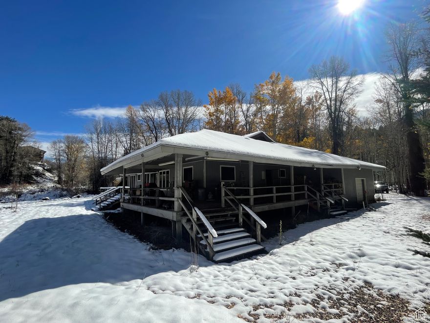 This great cabin is one of a kind with its location being right where the Smith and Morehouse River converges with the Weber River.  What a beautiful site to wake up to every morning as well as to relax and enjoy on the oversized deck wrapping the cabin.  How can you beat that two very popular rivers coming together in your back yard.  Inside you will find a large kitchen/greatroom with a nice stone fireplace for comfort along with 4 bedrooms and 3 bathrooms plus an oversized attached garage for all of your toys to build family memories in such a desirable Beaver Springs Community.  Being only minutes away from skiing in Park City or on our magnificent lakes nearby only add to this exceptional home.  Take advantage of rewarding yourself with a peacefull calming place you can call home in the mountains but so close to the needed necessities of life.  Buyers to verify all.