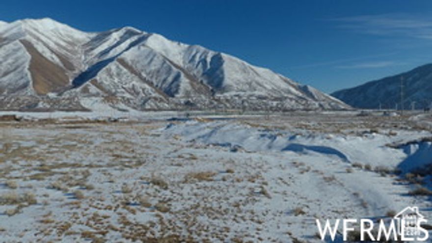 Excellent development opportunity on Hwy 89, nearly 1,000 new single family/residential properties around this parcel, zoning allows mixed use of commercial and multifamily to be built on this property, Verify project details with Mapleton City.