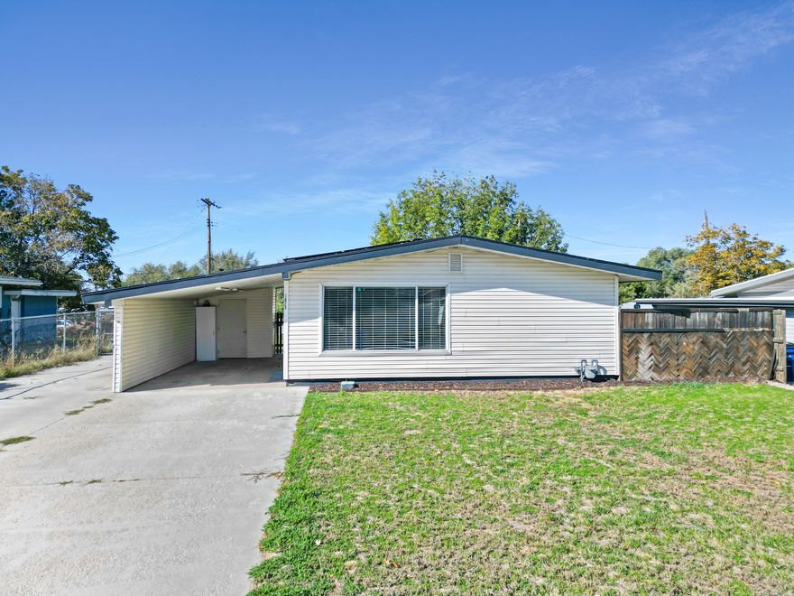 Walk into instant equity and enjoy the ease of single-level living in this recently updated home, refreshed within the last five years. You'll fall in love with the amazing kitchen, complete with newer stainless steel appliances, soft-close cabinetry, and granite countertops. Perfect for cooking and entertaining. This home features double-pane windows, a roof less than 5 years old, and best of all, owned solar panels to keep energy costs low all year long! Step outside to a large, fully fenced backyard with full automatic sprinklers, conveniently controlled through the B-Hyve app. Plenty of space for play, pets, or gatherings. Located just minutes from Hill Air Force Base, freeway access, schools, and shopping, this home offers both comfort and convenience.