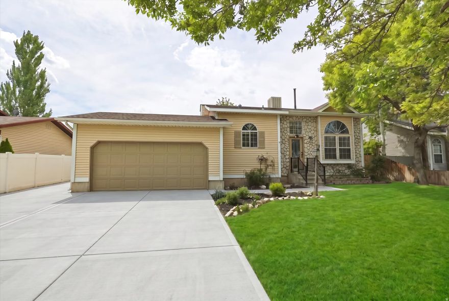 Open House Saturday, May 23rd from 11:00 AM to 1:00 PM. Updated West Valley City rambler featuring 5 bedrooms, 2 bathrooms, and 2,018 sq ft on a fully fenced 0.17-acre lot with RV parking, finished daylight basement, attached 2-car garage, and a 6-year-old roof. This move-in ready single-family home offers an updated kitchen, extra-wide driveway, and flexible living space ideal for multi-generational living, work-from-home setups, or growing households. Interior highlights include luxury vinyl plank flooring, travertine tile, bay box windows, double-pane windows, forced air gas heat, and built-in dishwasher/disposal. Spacious backyard features mature landscaping, fruit trees, open patio, and storage shed. Conveniently located near Hunter High School, parks, shopping, dining, and commuter access in the Granite School District. No HOA. Includes refrigerator, microwave, range, ceiling fans, window coverings, and home warranty. Ideal for buyers searching for a West Valley City home with RV parking, updated kitchen, large yard, and extra storage. FHA, VA, conventional, and cash financing accepted.