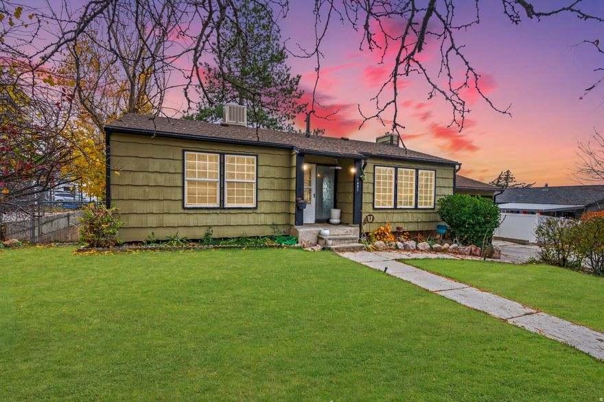 Incredible investment opportunity! This home features a fully remodeled separate basement apartment-ideal for rental income, guests, or multi-generational living. Furnishings are included, and the current owner has successfully rented it for $100 per night.  The apartment bedrooms are classified as dens in the listing as there are not windows in the rooms.  These two rooms are set up as bedrooms and have been rented that way.  Located just minutes from Ogden Canyon, you'll enjoy quick access to outdoor recreation: boating at Pineview Reservoir, fishing along the Ogden River, endless nearby hiking trails, and world-class skiing at Snowbasin Resort.  The main level boasts an open-concept layout with attractive laminate flooring. The home includes two full kitchens and two laundries, and all appliances stay. Major updates have been completed for peace of mind, including an upgraded electrical panel, new water heater, water softener, furnace, and A/C. All gas lines are new, and nearly all plumbing throughout the home has been replaced. Plenty of parking covered and uncovered for multiple cars or toys.  Don't miss this turnkey home with exceptional income potential and outstanding proximity to Utah's best outdoor amenities!