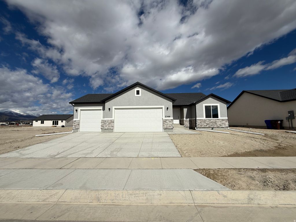 Photo of 2349 E SEGO LILIY DR #493, Eagle Mountain, UT 84005 (MLS # 2139713)