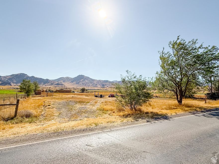 1.50 acre, corner, flat lot, with mountain views! This is the perfect spot to build your dream home out in the quiet country. Property highlights: State approved Highway 125 access, culinary water tap and meter installed, power available, 2 water shares, 1 acre fully fenced - ready for horses or livestock, fruit trees (peach, sweet cherry, pear, apple, nectarine and plum), tilled garden plot, raspberry and blackberry bushes. Information is deemed reliable but not guaranteed, buyer to verify all information.