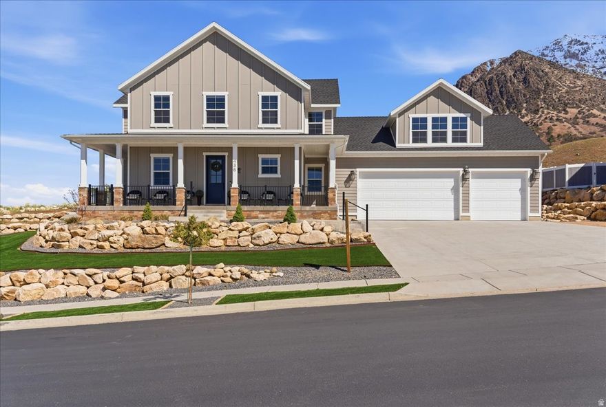 Set in a sought-after area of North Ogden with wide-open city and mountain views, this meticulously designed home blends refined finishes, thoughtful functionality, and everyday comfort.  High ceilings, designer lighting, accent walls, custom shiplap details, three-tone paint, and high-end flooring create a layered interior that feels both warm and sophisticated.  At the heart of the home, the gourmet kitchen strikes the perfect balance between style and practicality. Custom cabinetry, Calcutta quartz, double-thick countertops, and GE Caf professional appliances-including double ovens and a built-in convection microwave-come together in a space that feels elevated yet highly usable. A custom shiplap backsplash adds texture and character, while a beautifully finished butler's pantry keeps entertaining effortless and daily life organized. Custom power shades throughout, along with blackout shades in every bedroom, enhance comfort and convenience, while smart switches and blinds bring modern ease to the experience.  The main living area is designed for comfort as much as style, centered around a fireplace that creates a warm, inviting atmosphere-perfect for relaxing evenings or gathering with friends and family.  The layout is both functional and flexible, ideal for quiet nights or larger gatherings. A fully finished basement extends the home with a second full kitchen featuring upgraded appliances-perfect for hosting, multigenerational living, or long-term guests. Storage is abundant and thoughtfully integrated, including massive cold storage, while the laundry room has been elevated with custom pull-down drying racks and a clean, well-designed finish.  Upstairs, the bedrooms offer a private and comfortable retreat, with generous space, thoughtful layout, and a cohesive design that continues the home's elevated feel-ideal for both rest and everyday living.  The oversized garage continues the theme of function meeting quality, complete with an epoxy floor and ample space for vehicles, gear, and an active Northern Utah lifestyle.  Outside, the property is designed to be enjoyed as much as the interior. Beautiful landscaping, premium front-yard turf, an automatic sprinkler system, and a large covered front porch create a polished yet low-maintenance setting. A swim spa with pergola and power cover lift offers a private, resort-style retreat, while Jellyfish lighting, a grill gazebo with natural gas hookup, a 10' x 16' shed, and a whole-house emergency generator add both ambiance and peace of mind.  All of it comes together in a home that feels ready for every season.  While conveniently located in North Ogden, this home still offers convenient access to the recreation that defines the area-boating and paddleboarding at Pineview Reservoir, skiing at Powder Mountain, Snowbasin Resort, and Nordic Valley, along with year-round hiking, biking, and golf. All property information, boundaries and documents to be verified by buyer.