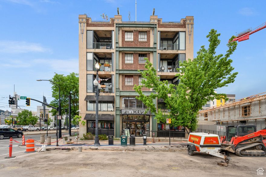 Amazing Live/Work or Office/Retail in the Historic Dakota Lofts in downtown Salt Lake City. Just steps away from the Delta Center home of the Utah Jazz and Utah Mammoth. This unit has direct access to 400 West facing the Gateway with a Trax station right in front and Free 2-hour parking makes for great access to everything you need or your clients might need. This two-story condo was recently improved with fully custom, high-end features. It includes a built-in, two-person workstation and half-bath downstairs, providing a useful work environment. Space upstairs is maximized with a full custom kitchen with KitchenAid refrigerator, freezer, and dishwasher drawers, plus a built-in microwave, Super Susan pantry, and new range. The custom bamboo cabinetry features plenty of storage with full-extension, soft-close doors and drawers.This unit is not part of a rental cap, but it must be a one-year-minimum lease, it offers gated/secured designated parking and a large storage unit, and its walls have increased soundproofing. The Buyer and Buyer's Agent are responsible to verify all listing information, including square feet/acreage, to Buyer's own satisfaction. Owner/Agent in Utah