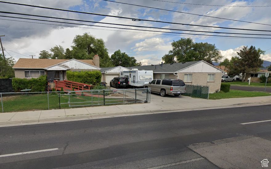Unique Tri-plex in Prime Location! This is a solid home with garage and an attached duplex, with units each featuring 2 bedrooms, 1 bathroom, and open-concept living. Perfect for investors or owner-occupants. Located with easy access to schools, parks, and the freeway and TRAX.  Ample parking. Don't miss out on this versatile gem-One duplex unit is currently vacant. Don't disturb tenants- offer contingent on inspection.