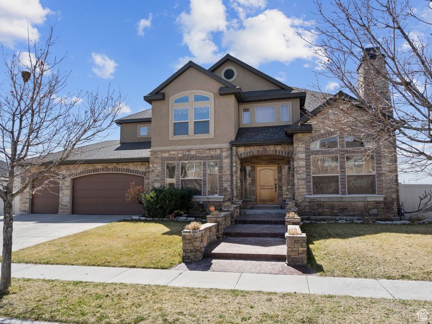 Located in the desirable Ivory Highlands community, this home offers the largest floor plan in the neighborhood with 6,741 square feet of finished living space. The layout is ideal for entertaining, featuring hardwood floors, granite countertops, multiple living areas, and a spacious three-car garage.  The walkout basement is fully finished with a separate entrance and offers excellent flexibility for a potential ADU, rental income, or multi-generational living. A dedicated theater room adds a fun and functional bonus space. With five bedrooms, five full bathrooms, and a thoughtful design throughout, this 2006-built home provides space, comfort, and versatility in a great location.