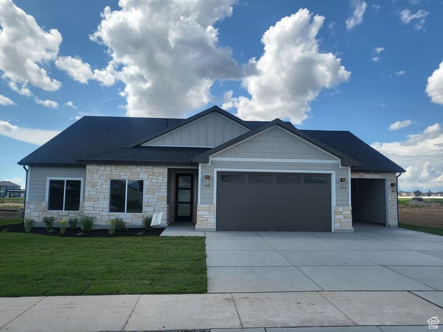 The HAMILTON is one of our most loved floorplans. Welcome to your home. This 3 bed, 2 bath home was thoughtfully designed for comfort and convenience. Located in a sought-after 55+ neighborhood, this home provides the perfect balance of style, functionality, and low maintenance living. Enjoy the open-concept with spacious interiors that flow seamlessly to a large covered patio, ideal for outdoor dining and relaxation. The home comes complete with full landscaping and fencing, so you can simply move in and start enjoying your new lifestyle.  Currently under construction. Be in your new home right after the new year!  **Photos of Previous Hamilton Model Home   Call me for incentive details!