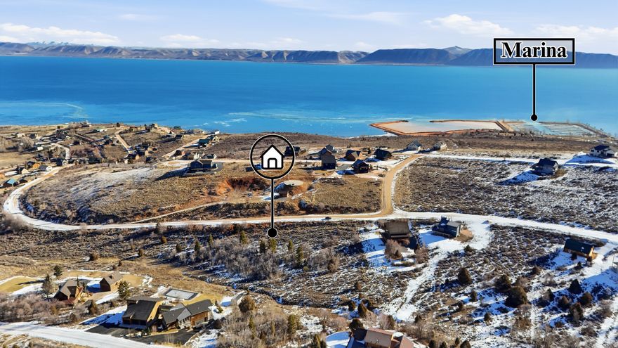 Discover the perfect canvas for your dream home with this stunning lot nestled in the charming Swan Creek Village HOA. This beautiful parcel, slightly elevated on a slope, offers year round access and breath taking views of the mesmerizing blue waters of Bear Lake --- ideal for enjoying serene sunsets and picturesque landscapes with year-round access. This affordable land is a golden opportunity for anyone looking to build their ideal retreat, vacation home, or permanent residence. Contact us today to explore the possibilities that await you at Swan Creek Village! HOA does not allow short-term rentals. www.swancreekvillage.org HOA fee includes culinary water use, snow removal & road maintenance. Buyer to verify all information and building restrictions. Owner/Agent