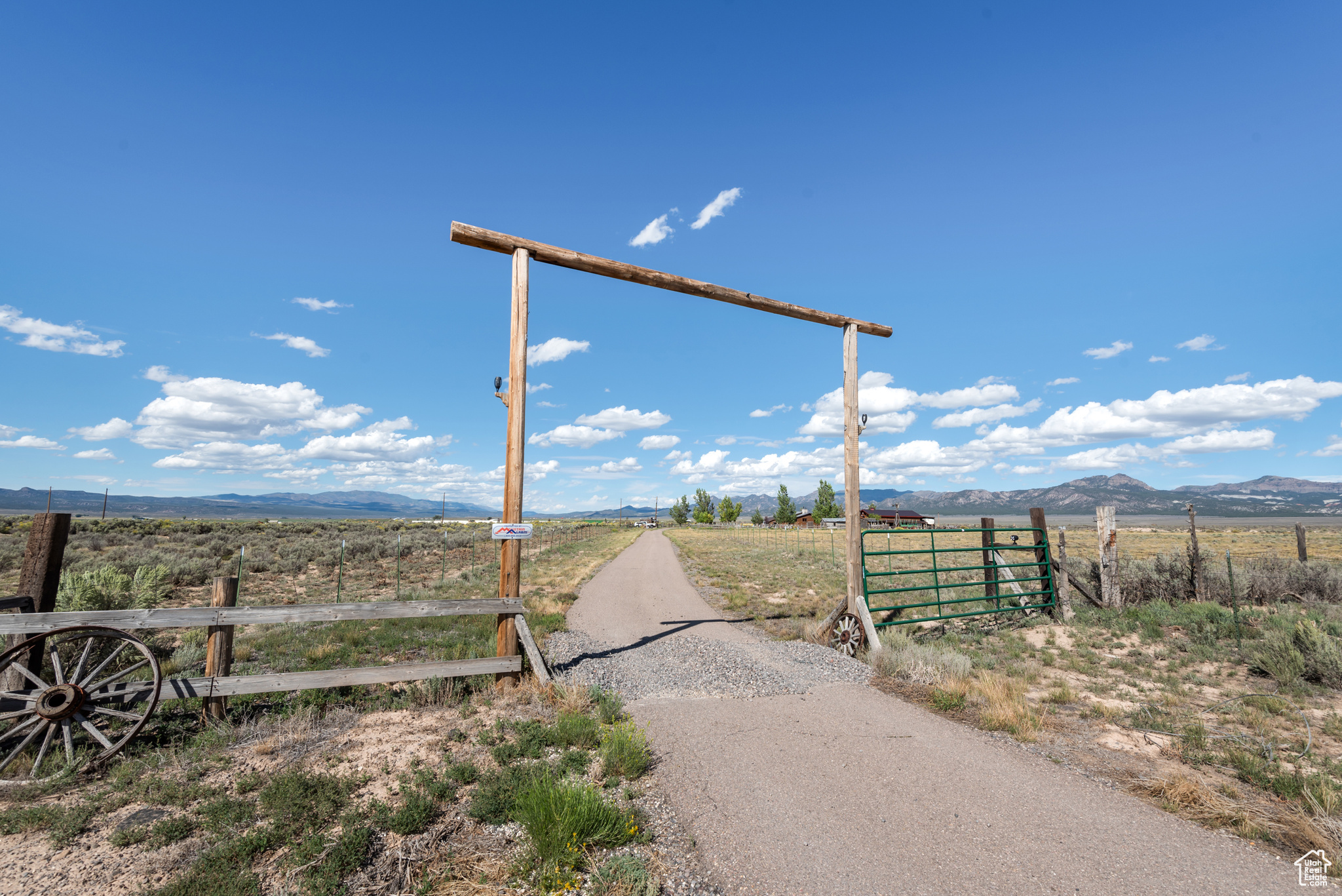 Discover a truly unique 75-acre property. This ranch-style home, built in 1989 and beautifully maintained, offers nearly 3,000 square feet of living space. Updates include a tankless water heater, new furnace, water softener, central A/C, and a full backup generator installed within the last year. A remodeled kitchen completed just two years ago adds modern efficiency while maintaining the property's rustic character. Step outside to the peaceful back porch and take in amazing, unobstructed vista views that stretch across the surrounding red rock and mountain landscape-perfect for quiet mornings or unforgettable sunsets. Outdoors, the amenities shine: outbuildings include a 36x47 barn/garage, local historic buildings, a workshop with wood-burning fireplace and forced air, covered RV storage, chicken coop, dog run, koi pond, greenhouse with automatic watering, automatic sprinklers, water, and mature trees. This property conveys with 10 shares of East Bench irrigation water (adequate for our 5 acres in pasture grass) and enough West Panguitch shares for two additional wells. making this property an investment as well as a private retreat. Whether you envision a working ranch, private homestead, or a legacy property with expansion possibilities, this estate provides unmatched versatility and value in a picturesque valley.