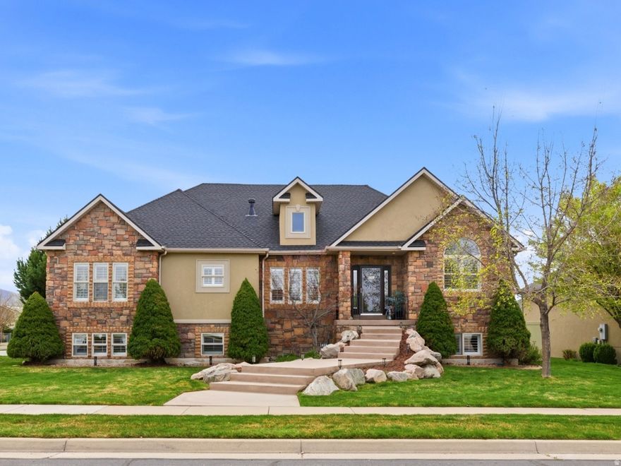 Stunning rambler on a .47-acre corner cul-de-sac lot. Built in 2003, this 3,900+ sq ft home offers 5 bedrooms and 3 baths with a finished basement featuring a wet bar and generous living space. North-facing for great natural light, it backs to a tranquil stream, boasts mountain views, and is surrounded by mature trees for privacy. Recent updates include new carpet and newer appliances. Outdoor living shines with a very large deck, multiple patio areas, pergolas for shade, and space for an outdoor fire.  Enjoy the mature trees and creek out back for a secluded retreat feel. The property includes a 3-car garage with extra height and width and a wide driveway. Located near bike trails, with easy access to the corridor and freeway, and close to shops and stores for convenient everyday living. **At the request of the seller, no showings until the OPEN HOUSE**