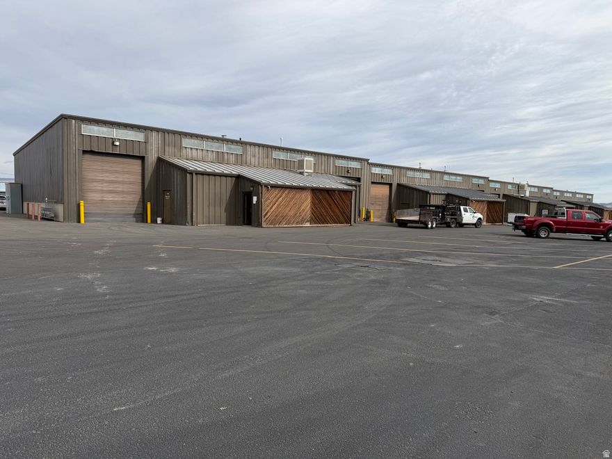This well maintained 8 Unit Commercial Industrial building is located just  to the northeast of the Vernal Regional Airport.  This property would make a great addition to your investment portfolio.  It is approximately 19,756 SF.  Each unit has an office with a dedicated glass door entrance.  Each unit has a 12'x14' overhead door and an entry door to the shop area. This building has had some recent updates.  New asphalt parking lot and striping in 2025.  All new metal roof and upgraded ceiling insulation in 2019.  New LED light fixtures throughout in 2021.  5 of the 8 overhead furnaces have also been replaced in recent years.   The industrial building next door is also for sale by the same owner.  See MLS# 2136300 for more details.  Buy one building or buy both! Qualified buyers/investors call the listing agent at 385-255-6829 with regards to rents and any questions.  Buyer is required to verify all information provided in this listing or by the listing agent. Information sourced from county records and appraisal.  Seller and agent are related.