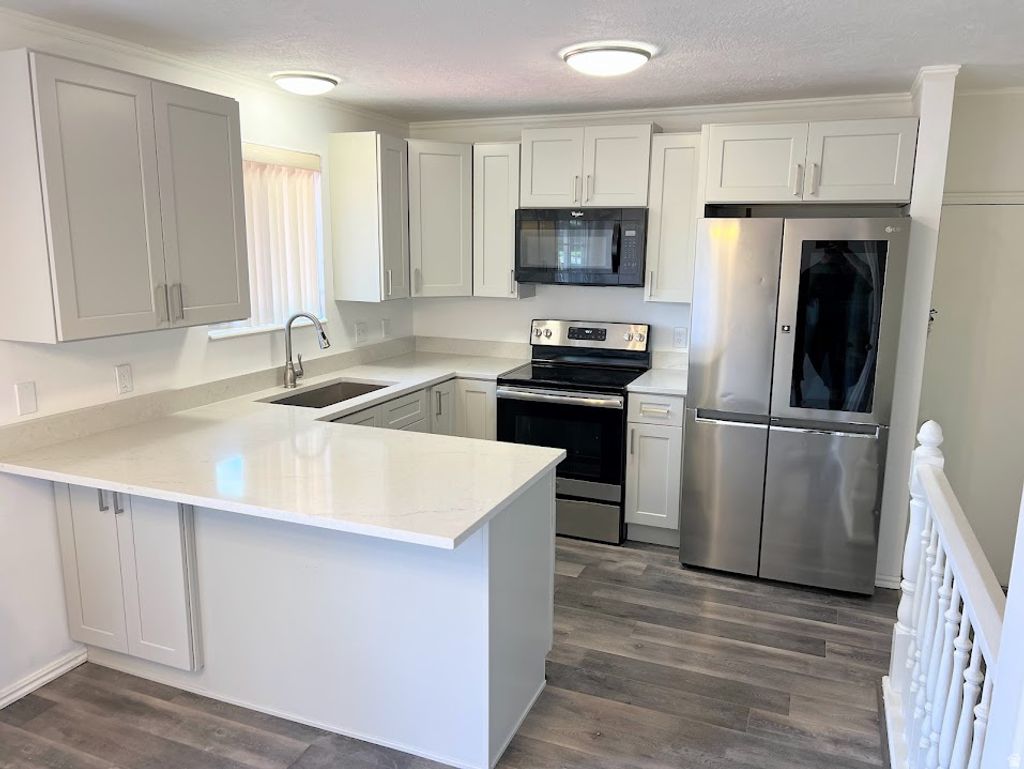 Photo of 5124 W FUCHSIA DR S, West Jordan, UT 84081 (MLS # 2148743)