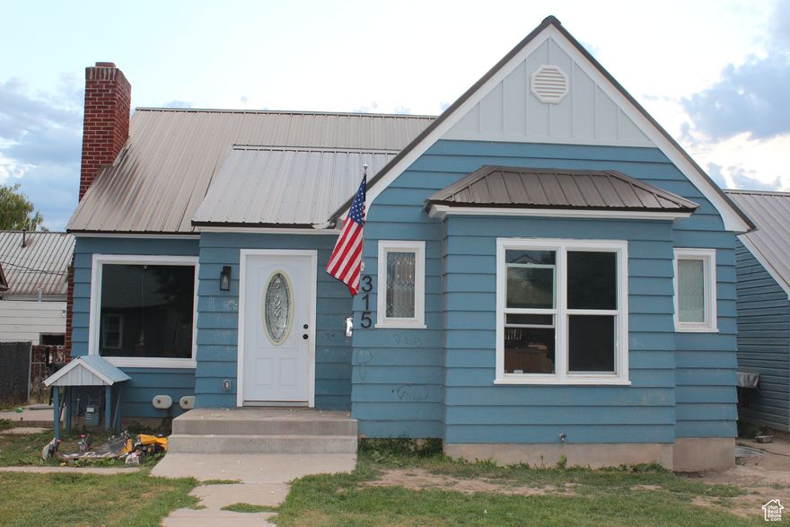 Come see this inviting home in a quiet Bear Lake neighborhood, offering an open layout, generous storage, and a versatile unfinished attic.  Extensively remodeled in recent years with updated electrical, flooring, paint, windows, roof, stack-stone fireplace, and a refreshed kitchen and baths, the home blends modern upgrades with everyday comfort.  The living room, dining space, and kitchen flow together for easy gathering or entertaining. The kitchen features updated cabinets, modern appliances, and patio access for relaxed indoor/outdoor dining. Two bedrooms can serve as a primary suite, each with a walk-in closet, while an endless hot water system adds convenience for a busy household.  A detached three-car garage offers abundant storage for vehicles, toys, and gear. Upstairs, an unfinished attic (approx. 878 sq ft) provides exciting potential for added living space, an office, or hobby area-ready for a buyer's vision.  While the home shows signs of normal use by a large household, the thoughtful remodel makes it move-in ready with opportunity to personalize further. Located minutes from shopping and schools, 30 minutes from Bear Lake North Beach, and 5 minutes from Montpelier Canyon, this property suits year-round living or a vacation retreat.