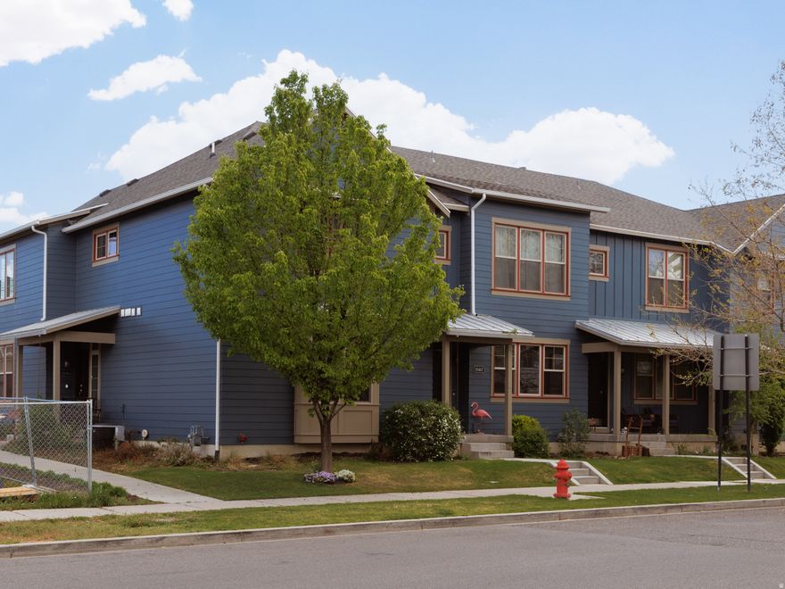 This isn't just a home...it's a lifestyle. Located in the highly sought after Eastlake Village of Daybreak, this home offers the perfect blend of comfort, convenience, and community. Just steps from the shores of Oquirrh Lake, you'll enjoy easy access to scenic walking and biking trails, along with opportunities for kayaking, paddle boarding, and relaxing lakeside views. Thoughtfully designed for everyday ease, the home features desirable single level living along with off street parking for up to four vehicles...a rare and valuable offering in this area. The sizable yard offers additional flexibility and can be enclosed, creating the perfect opportunity to create your private outdoor retreat. Inside, the home welcomes you with a beautifully designed open-concept layout, where a bright interior is filled with natural light from expansive windows and enhanced by impressive vaulted ceilings. The kitchen is both stylish and functional, showcasing rich wood cabinetry, quartz countertops, a large island, durable laminate flooring, and a custom backsplash-ideal for both everyday living and entertaining. The main-floor primary suite offers a comfortable and convenient retreat, complete with a walk-in closet, a garden tub with shower, quartz countertops, and a stackable laundry area for added ease and efficiency. Situated in one of Daybreak's most established and walkable neighborhoods, this home provides convenient access to nearby parks, community amenities, and the vibrant SoDa Row district-featuring local dining, shopping, and year-round events like farmers markets and concerts. You're also just minutes away from the new Salt Lake Bees Stadium, adding exciting entertainment and future growth to the area. The community is thoughtfully designed to encourage connection, with tree-lined streets, welcoming front porches, and inviting shared spaces. Enjoy the balance of a quiet residential setting with close proximity to everything you need, including TRAX light rail for an easy commute to Salt Lake City and surrounding areas. With mature landscaping, nearby recreation, and a strong sense of community, this location offers a truly exceptional living experience in one of South Jordan's most sought after communities. Recent updates include a new water heater (2025) and a new furnace (2023).