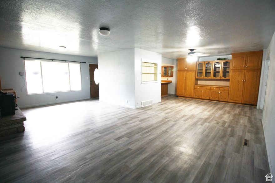 Remodeled Upstairs and Downstairs. New Carpet, Paint, LVP, Garage Roof. 3 Bedrooms, 1 Full Bathroom on the Main Floor with a Formal Living Area, Formal Dining Area, and Family Room with a 2 car Garage. Basement is Currently Rented and has a Separate Entrance (Require 24 hr. notice on showings). Main Floor is Currently Vacant (Easy to Show). Could be purchased to Live in and Rent out the Basement or Rent both Areas.
