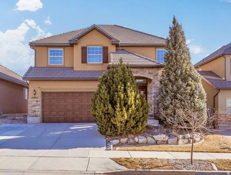 Quiet, elevated living above the inversion in Draper's SunCrest (Utah County side), with the fantastic HOA offerings (swimming pool with slide and lazy river, modern gym facilities, club house and community events), offering panoramic mountain views, blue-sky days, and a peaceful alpine feel just minutes from grocery stores, restaurants and Silicon Slopes. This move-in ready home features a durable 50-year tile roof, new LVP flooring throughout, and a fully landscaped, fenced yard with a Trex deck; perfect for relaxing or entertaining.  The unfinished basement offers room to grow and build equity, already plumbed for a fourth bathroom. Enjoy a true outdoor lifestyle with direct access to Corner Canyon's extensive trail system for hiking, biking, and open space off-leash dog areas. Home is currently covered and protected with a Fidelity National Home Warranty, and an additional year of coverage will be paid by the seller for added peace of mind. View video here: https://video.helloarti.com/video/87460.mp4  Square footage figures are provided as a courtesy estimate only and were obtained from County Records; buyer is advised to obtain an independent measurement.