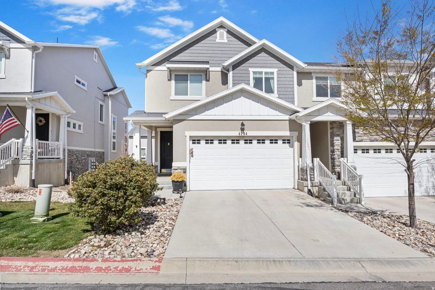 Come and see this gorgeous row-end townhome located in a perfect location of Herriman! Beautiful upgrades throughout the home. Vaulted ceilings with open floor plan. Gas fireplace in living room. This townhome includes 3 large rooms upstairs, including a large walk-in closet. This home also sits on higher elevation that allows for amazing views of the Salt Lake Valley. There are nearby trails for hiking and biking. This community has a clubhouse with a large swimming pool and picnic pavilion.