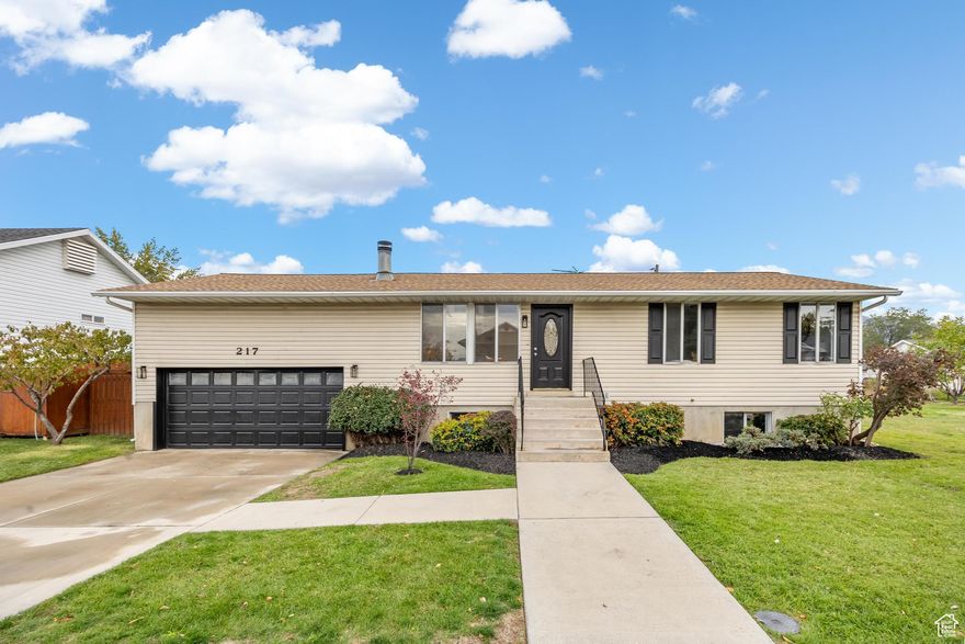 Offer Received, "Highest & Best" due Monday at noon. l o v e   w h e r e   y o u   l i v e  This home was Beautifully Remodeled and is Move In Ready!  Recent Improvements include, new roof, AC coil and exterior AC condensing unit, water heater, carpet, LVP, paint, LED lights, cabinets painted white and white quartz counter tops. This home features 4 bedrooms, 2 bathrooms, living room by the front door with a fireplace, vaulted ceilings, a family room in the basement and a loft area above the garage. The home is located on a large .37 acre lot, on a quiet street near Lakeridge Junior High School, UVU, beautiful parks, jobs, restaurants and shopping.  This home is a must see. Call today to schedule a private showing!