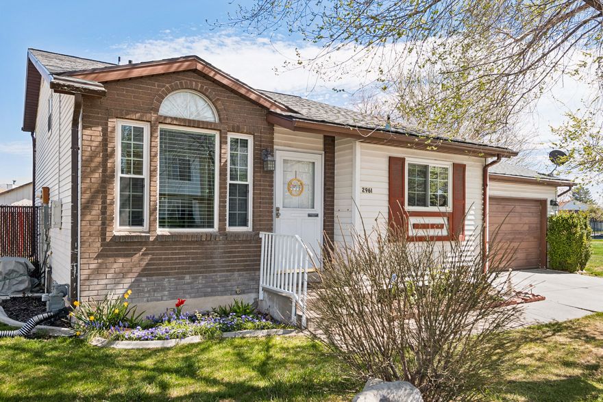 Welcome to an Absolutely Charming Spacious home that's full of personality comfort and easy living!*Perfectly situated on a desirable corner lot this Multi-Level Gem offers a unique layout that feels both spacious and cozy at the same time*Step inside and you'll immediately notice the soaring vaulted ceilings that create an airy light-filled atmosphere*perfect for relaxing or entertaining*The walk-out basement adds incredible flexibility*You can envision a private retreat guest space or a fun hangout area that opens right to the outdoors*With a smaller yard enjoy just the right amount of outdoor space easy to maintain Patio while still perfect for enjoying fresh air and Sunshine*This home is designed for comfort and convenience incl a large family room and central air to keep you cool*a water softener for everyday ease*spacious 2-car garage*You'll also love the peace of mind that comes with major updates already done Roof*Vinyl Windows and Gutter Guards all updated within the past 5 years*Location? It doesn't get much better*Just minutes away from a variety of restaurants*fitness centers* Target*Walmart shopping*even a golf course*you'll have everything you need right at your fingertips*This home blends style practicality and a fantastic location into one inviting package*Come see how effortlessly it fits your lifestyle!