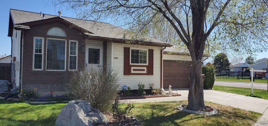 Welcome to an Absolutely Charming Spacious home that's full of personality comfort and easy living!*Perfectly situated on a desirable corner lot this Multi-Level Gem offers a unique layout that feels both spacious and cozy at the same time*Step inside and you'll immediately notice the soaring vaulted ceilings that create an airy light-filled atmosphere*perfect for relaxing or entertaining*The walk-out basement adds incredible flexibility*You can envision a private retreat guest space or a fun hangout area that opens right to the outdoors*With a smaller yard enjoy just the right amount of outdoor space easy to maintain Patio while still perfect for enjoying fresh air and Sunshine*This home is designed for comfort and convenience incl a large family room and central air to keep you cool*a water softener for everyday ease*spacious 2-car garage*You'll also love the peace of mind that comes with major updates already done Roof*Vinyl Windows and Gutter Guards all updated within the past 5 years*Location? It doesn't get much better*Just minutes away from a variety of restaurants*fitness centers* Target*Walmart shopping*even a golf course*you'll have everything you need right at your fingertips*This home blends style practicality and a fantastic location into one inviting package*Come see how effortlessly it fits your lifestyle!