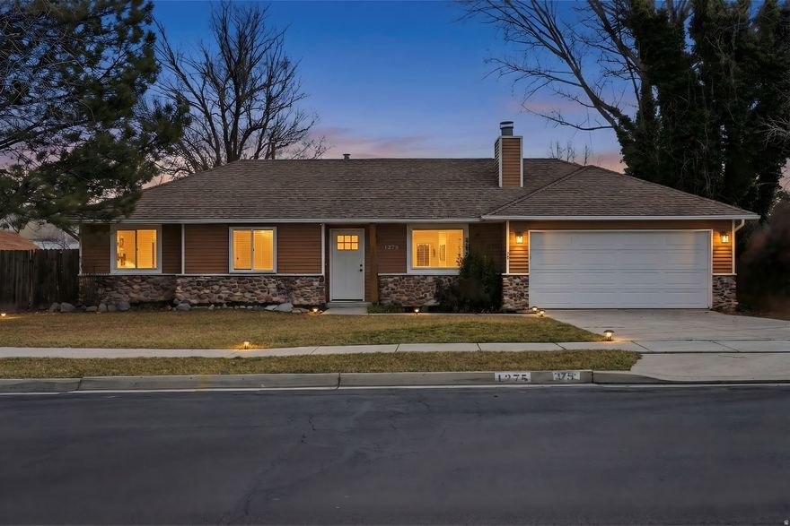 **Open House this Saturday March 14th 2-4PM**** Entertainer's delight with lots of natural light. This well maintained single level rambler is located in a great West Jordan neighborhood. The home is move-in ready and features beautiful hardwood floors throughout, newer carpet, fresh two tone paint, an updated kitchen, and newer central air. The open floor plan with vaulted ceilings and a cozy gas fireplace in the living room creates a warm and inviting space. The layout offers comfortable single level living with spacious rooms, a primary bedroom with its own bathroom, ceramic tile, and a two car garage. The backyard is large, private, and fully fenced with mature trees, a storage shed, and a fenced dog run or garden area. RV parking is available behind the gate, and the yard includes a fully automatic sprinkler system. Located near schools, parks, and shopping with quick access to Bangerter Highway and I 15. Easy to show. Buyer to verify all information.  Please feel free to edit and send back any edits or confirm this is good.  Buyer and Buyer's agent to verify all.