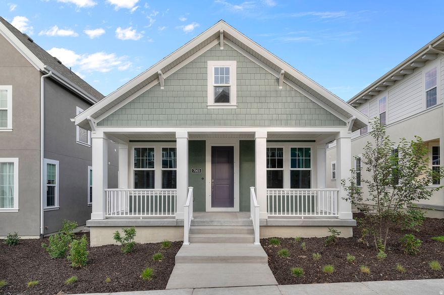 Welcome to the Whitmore Craftsman - a beautifully designed home that blends comfort and style with functional elegance. Featuring sleek gray laminate cabinets, quartz countertops, and stainless steel gas appliances, the kitchen serves as the heart of the home. Durable laminate hardwood, vinyl tile, and carpet flooring provide a warm and practical foundation throughout. Also featured you will find energy-efficient features, a tankless water heater, can lighting, and a festive Christmas light outlet package for year-round convenience. A wood railing at the stairway and classic Craftsman base and casing add to the home's timeless charm. In the owner's bathroom, enjoy the refined look of cultured marble shower surrounds paired with brushed and satin nickel hardware - a serene space to unwind in style. Comes fully landscaped and is located in the great Daybreak community near parks, schools, trails and more!