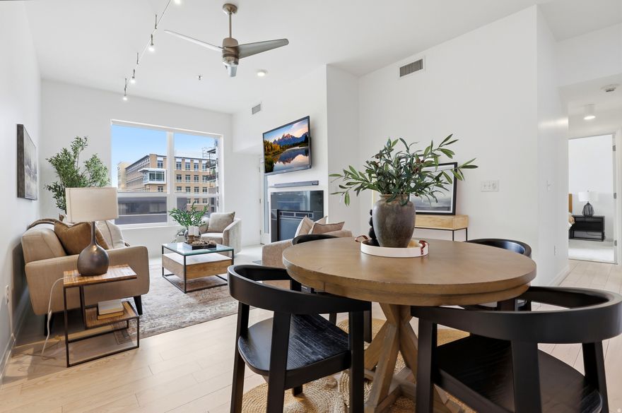Enjoy the best of downtown living in this bright and inviting 2-bedroom, 2-bath condo in the heart of Salt Lake City. The unit also includes a storage closet on the same level that provides great additional storage. Located just steps from Washington Square and the iconic Salt Lake City Public Library, this condo offers unbeatable walkability to shopping, dining, coffee shops, and everyday essentials; including Harmons just a couple blocks away. Convenient access to nearby hospitals and the University of Utah makes this an ideal location for professionals, students, or anyone wanting an urban lifestyle.  Inside, you'll find great natural light, a spacious kitchen, and a comfortable family room overlooking the peaceful patio courtyard area (complete with furniture and grills to have a BBQ).  Washer, dryer, and all appliances are included for an easy move-in experience.  The condo also includes two dedicated parking spaces - one covered and one uncovered - in a secure, gated garage with key-access entry for added peace of mind. Residents enjoy access to a clubhouse for larger gatherings, a small fitness room, and Planet Fitness conveniently located right next door.