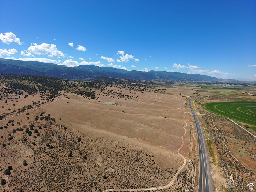 236 acres with over 1/2 mile of frontage on both Hwy. 89 and Pigeon Hollow Rd. Possible Commercial usage at Pigeon Hollow Junction. Many uses possible. Beautiful valley and Temple Views. Rocky Mtn. Power runs across the north end of property. Tax I.D. # S-5159X is also included. Please view tour.
