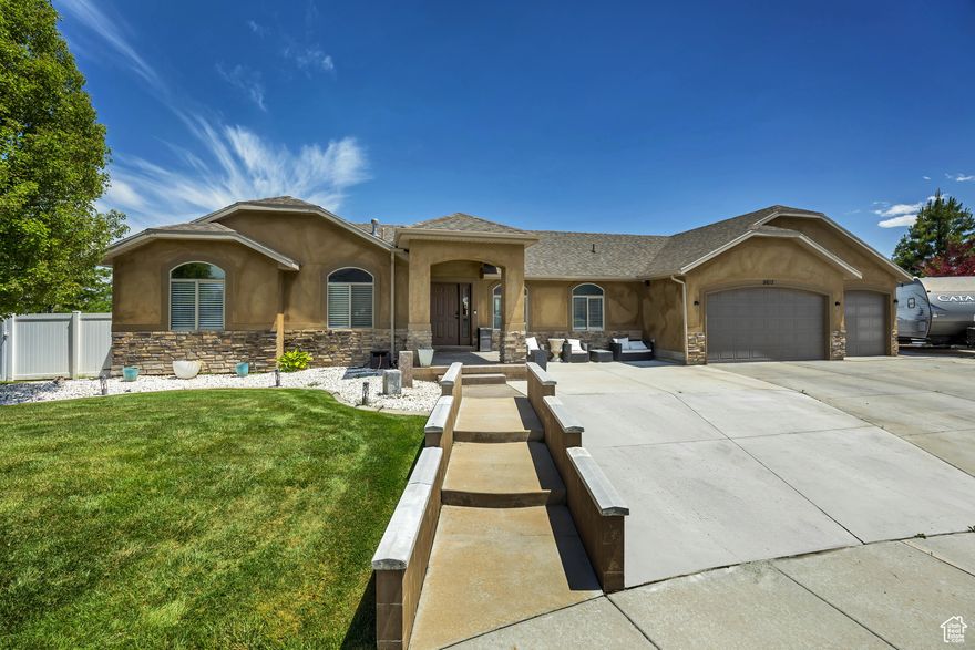 Beautifully maintained 6-bedroom 3-bathroom home in Herriman. Open concept main level with large primary suite.  Fully finished basement with spacious family room and bar. Amazing backyard, perfect for entertaining - features a shaded pergola, a sparkling swimming pool with a thrilling 40-foot slide. Convenient RV parking adds to the home's appeal. Close to schools, parks and shopping.