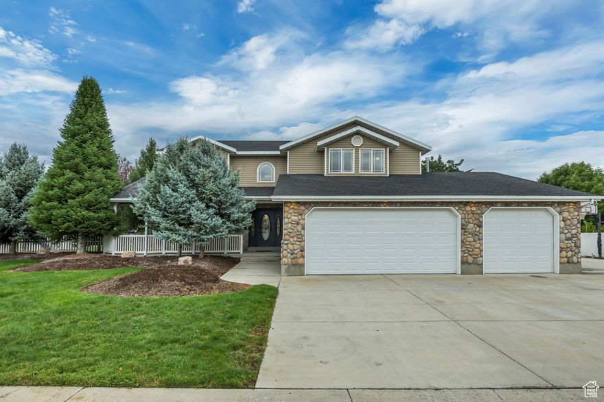 Welcome to this charming 2-story home in the heart of American Fork! Nestled on a private corner lot surrounded by mature trees, this inviting property offers 5 bedrooms, 3.5 baths, and plenty of space for everyday living and entertaining. Hardwood flooring flows throughout the main living areas, complemented by fresh paint that makes the home feel bright and welcoming. The lower level features a second kitchen and a cozy theater room-perfect for gatherings or multi-generational living. Step outside to enjoy the peaceful backyard, complete with a water feature and a private patio shaded by the trees Car enthusiasts, hobbyists, or anyone in need of extra space will love the oversized (600+ sq ft, plus large loft) detached 2-story workshop, complete with 220 power, mini-split for heat and AC, and a large vacuum for woodworking, making it ideal for year-round use for all your hobbies! Centrally located near schools, shopping, and entertainment, this home truly has it all: charm, functionality, and a setting you'll love coming home to. Don't miss the chance to make it yours-schedule your private showing today! Square footage is provided as a courtesy estimate only and was obtained by county records. Buyer is advised to obtain an independent measurement.