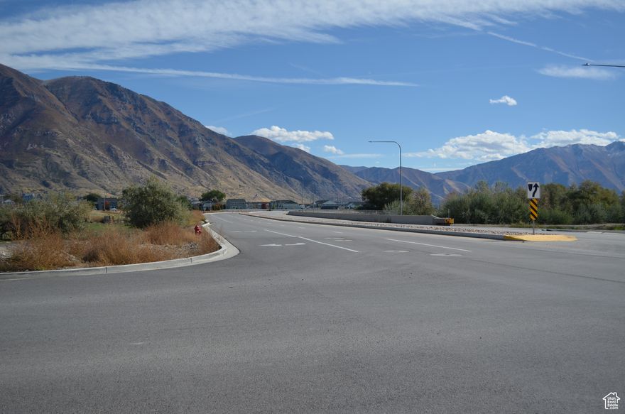 Prime Location for Your Convenience Store or Hotel!  Discover the newest growing area of Provo, just a mile from the latest Sports Park and the expanding airport. With a four-lane highway ensuring high traffic flow, this location is perfect for any growing business.