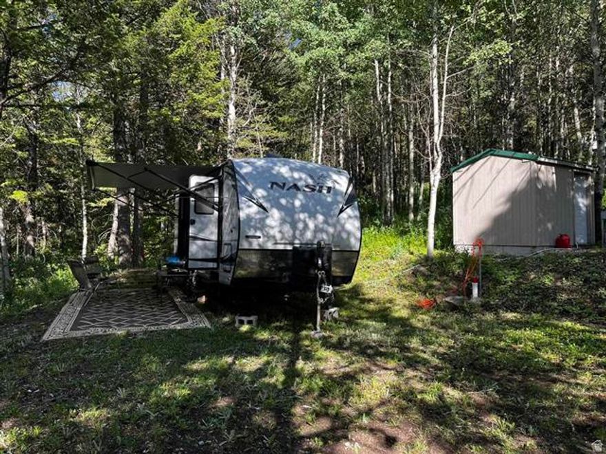 Great lot in Lava Ranch with a WELL! Don't worry about running all over the mountain for water, its right here! Heavily wooded and located at the end of a Cul-de-sac, this lot is quiet secluded! Hook up the RV and your ready to go! Septic System and RV Pad site, set up for you to come up for the weekend or the summer and unwind! Pump and pressure tank in well house below Storage shed! Gas generator included, Gated entry, Don't miss out on this lot!