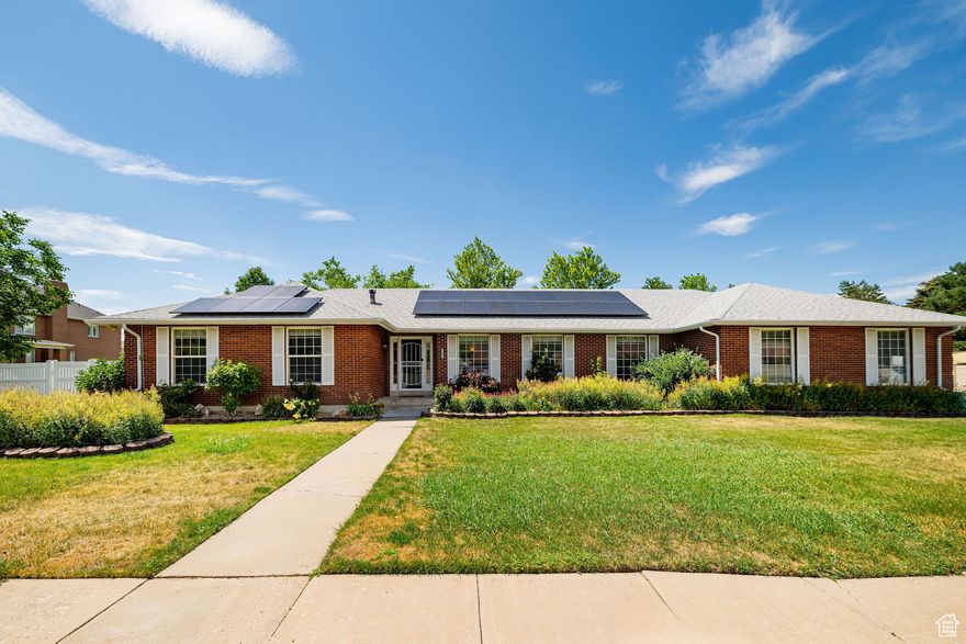 Located in the coveted Uintah Highlands neighborhood- where the homes have larger lots and are still close to all amenities and the mountains.  Nearly half an acre with panoramic mountain views, mature fruit and nut trees, and a large garden create a fantastic space for anyone who loves the outdoors. Fully-owned solar panels mean energy savings year-round. A steel beamed shed provides storage for all of your tools and toys. The primary suite has a fireplace, and thoughtfully remodeled, spa inspired primary bath with dual shower heads.  French doors in the primary lead directly the hot tub (included). A second full bathroom on the main floor is remodeled too. New carpet; New water heater and an HVAC system equipped with UV treatment and a whole home humidifier. Nestled on the boundary of Uintah and South Ogden, you're just minutes from downtown Ogden's shops and dining, Hill Air Force Base, and world class skiing, hiking, and biking in the Wasatch Mountains.