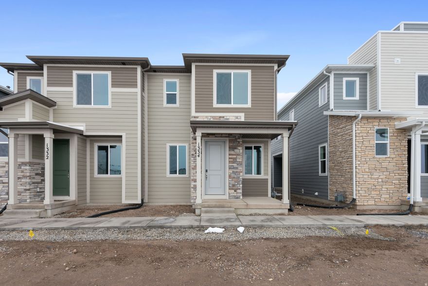 Builder Incentives Available! Contact Sales Associate for More Information *** The Chicago plan greets guests with a charming, covered porch and continues to impress with an open kitchen featuring a pantry, center island and adjacent dining room. The main floor also offers a powder room, an inviting living room, a covered patio with center-meet sliding glass doors, and a 2-car garage. Upstairs you'll find a convenient laundry and three generous bedrooms, including a primary suite with a walk-in closet and private bath. Designer curated finishes complete this semi-luxury home with quartz countertops throughout home and LVP flooring on main areas. Buyer to verify square footage.