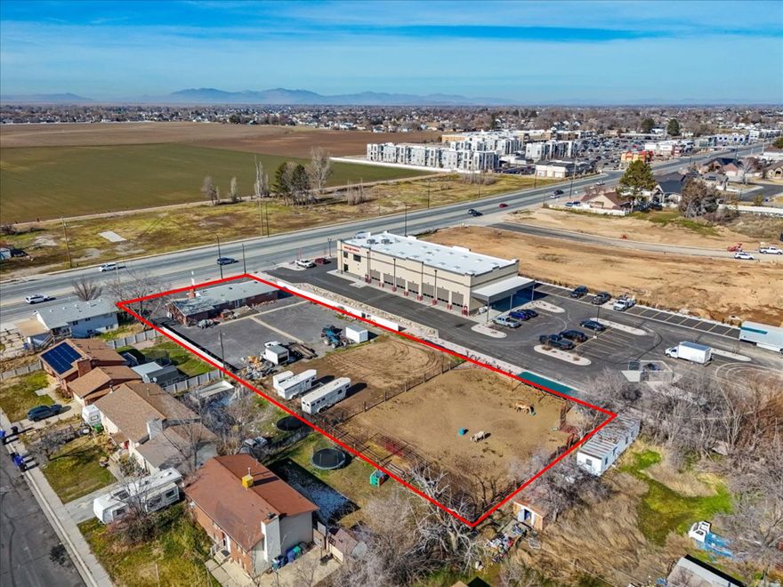 For sale or lease! This exceptional 1-acre parcel is ideally positioned along 2000 West in West Point, one of Davis County's fastest-growing submarkets. The property offers outstanding visibility and frontage on a major arterial road carrying approximately 30,000 vehicles per day, providing strong exposure and brand presence for a wide range of residential or commercial uses. For commercial users, neighboring zoning C-C and N-C Commercial allows for office, retail, restaurant, or mixed-use development. For residential users, current zoning R-2 and general plan zoning R-3 allow for multiple units with or without commercial accompanying. Surrounded by established businesses and residential uses, and the rapid ongoing growth, the property benefits from consistent traffic, strong local demographics, and proximity to key transportation routes connecting West Point to the greater Davis and Weber County markets. With its combination of high traffic counts, excellent accessibility, and flexible development potential, this parcel represents an outstanding opportunity to secure a premier location in a rapidly-expanding market! Parcel is being offered as development ground, assuming the removal of the existing structures. Ground lease negotiable.