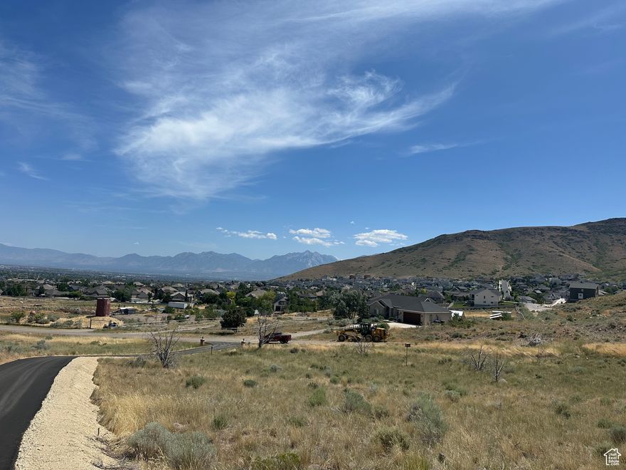 Rare Opportunity in Herriman! This stunning 5-acre lot offers peaceful country living with unbeatable mountain and valley views in every direction. Whether you're looking to build your dream estate or develop the property, this parcel offers incredible potential-zoned to allow up to five 1-acre lots. Enjoy the beauty of rural living without sacrificing convenience, just minutes from shopping, schools, and amenities. Don't miss your chance to own a piece of Herriman's scenic landscape with endless possibilities! Buyer & buyer's agent are advised to verify all information with Herriman City.