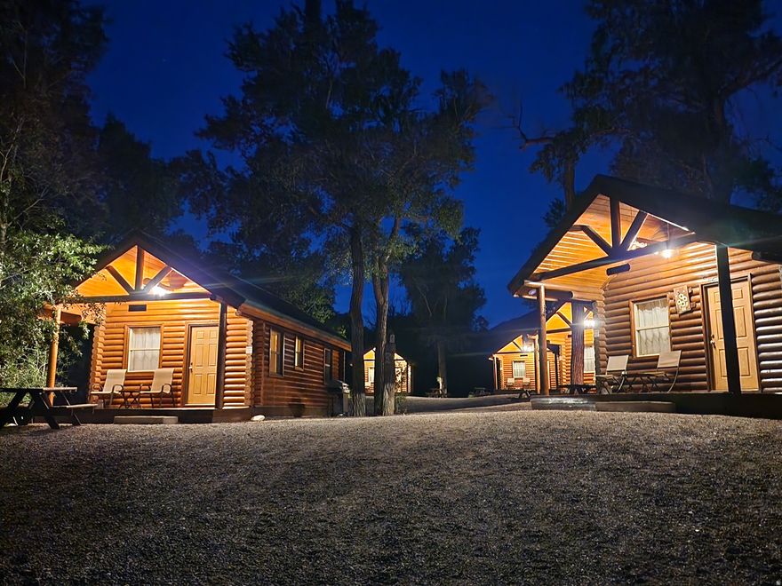 Beautiful cabin and RV resort along the famous Paiute OHV Trail in Marysvale, Utah. Set on a quiet, shady, and secluded 6.2 acre parcel along Pine Creek - a very desirable location.  Six rental cabins, primary cabin (this can be a 7th rental cabin), a glamping tent, and two full-hookup RV spots. Strong rental history and large guest list.  Turn-key operation with virtually no deferred maintenance. Included with sale: all linens, furnishings (except primary cabin), side-by-side utility vehicle with trailer, laundry equipment, cleaning supplies, bbq grills for each cabin, picnic tables, web site, domain, reservation system, and deposits from pre-booked reservations.  Property includes a 40'x40' insulated metal shop for storage and projects, large RV awning, office, laundry building, and two connex containers with awning between.  Over 2.5 acres are undeveloped for future growth.  Seller financing available with 50% down, 25 yr amortization, 6.5%, 4-year balloon.  We have run the property as a life-style business (living on property year round) and have found Marysvale to be a wonderful place to live. Winters are mild with very little snow. Health issues force us to sell earlier than we had planned. Please contact Todd Jackson at 801-599-6890 for showings or additional information.   Link to Additional Photos Below:   https://photos.google.com/share/AF1QipOEogWepuNnjyr_RsZuu8i5ym_7OMKSnkYokH-OePqvOlJ_nAPTmXfY3orjHNHBuA?key=dWZSV1lGcnQ4MkpEN2NiLWtUcmpWNjM5a3VQNG53    Square footage figures are provided as a courtesy estimate only and were obtained from County Records.  Buyer is advised to obtain an independent measurement.