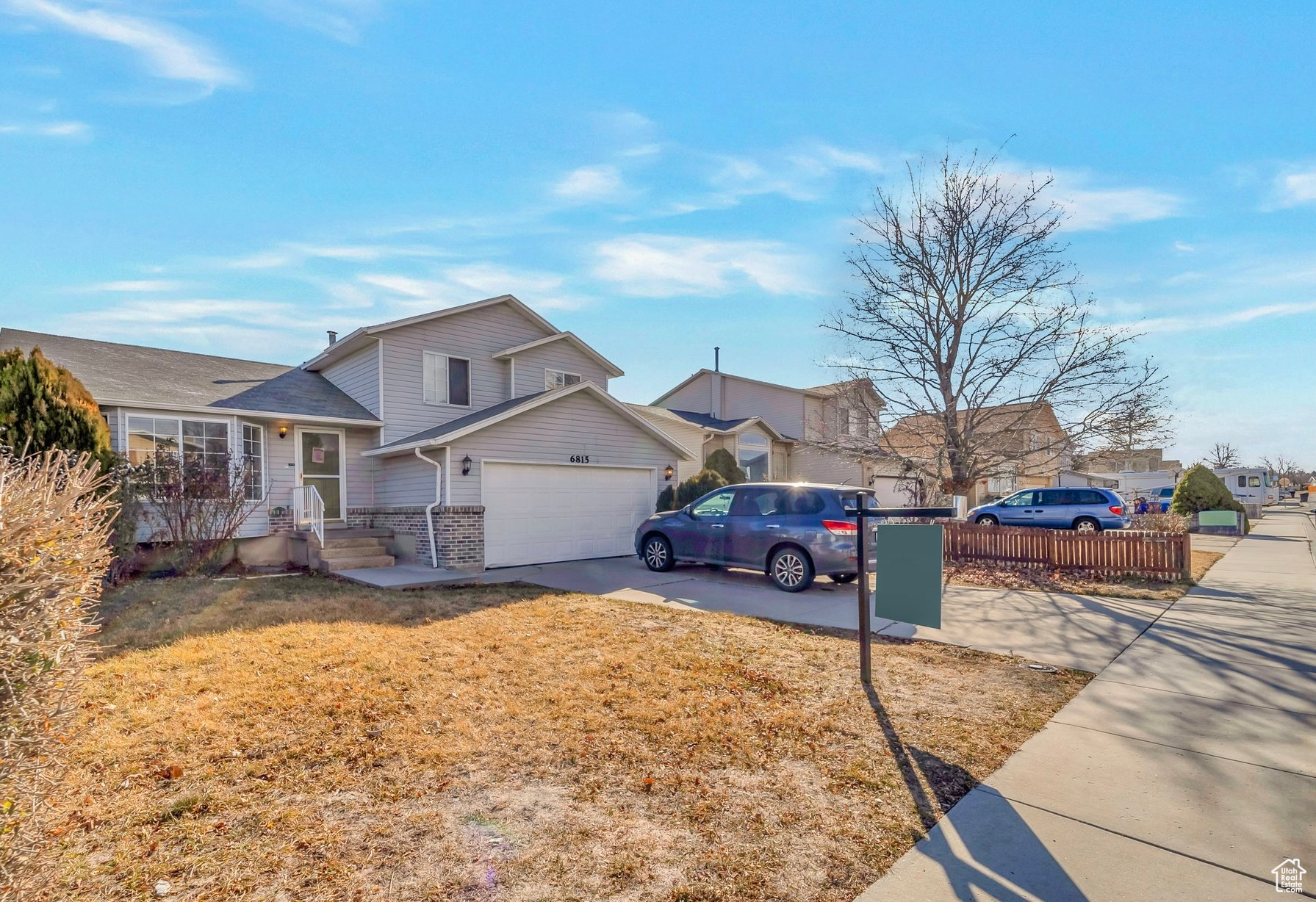 Welcome to this charming 5-bedroom, 3-bathroom tri-level home nestled in the heart of West Jordan. At nearly 2,000 square feet of well-designed living space, this home offers an open kitchen and dining area, a finished basement, and a large backyard perfect for entertaining or a quiet evening in under the covered back patio with Wasatch Mountain views. Just 10 minutes from Jordan Landing's shops, restaurants, and entertainment and plenty of nearby school options for your little ones.  Schedule a tour to start your next chapter in this beautiful West Jordan gem. SELLER FINANCING is available, making it easier than ever to make this house your home! Currently leased. Please be mindful not to disturb tenants-24 hours prior noticed require. Square footage figures are provided as a courtesy estimate only and were obtained from county records.  Buyer is advised to obtain an independent measurement.