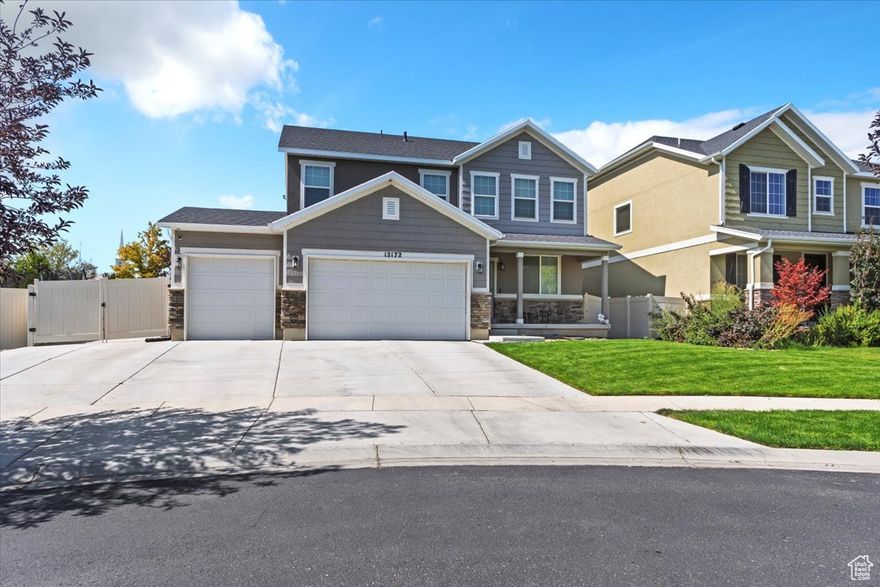 Beautifully designed 5-bedroom, 3.5-bathroom home built in 2017 offering space, comfort, and modern convenience! Nestled on a .14 acre lot, this well-maintained home boasts mature landscaping, fully fenced backyard, and a private patio-perfect for relaxing or entertaining.  Inside, the main floor features new carpet, an open-concept kitchen, a bright living room, a cozy family room, and a convenient half-bathroom off the family room.  Upstairs features new carpet, the primary suite includes an ensuite bathroom, along with 2 additional bedrooms, a full bathroom, a loft area for 2nd family room, and a laundry room for ultimate convenience. The fully finished basement expands your living space with 2 more bedrooms, a 3/4 bathroom, a 3rd family room, and extra storage.  A 3-car garage and an extended driveway provides ample parking and RV parking. Situated in a desirable Herriman neighborhood, this home offers easy access to parks, schools, shopping, and dining.